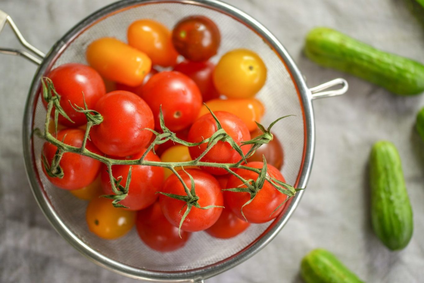 bowl of cherry tomatoes and cucumbers