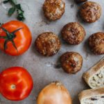 meatballs, tomatoes, onions, and bread